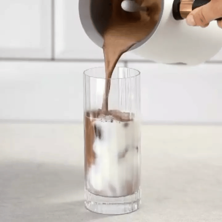 Animated image of luxury hot chocolate pouring over ice from Velvetiser hot chocolate maker