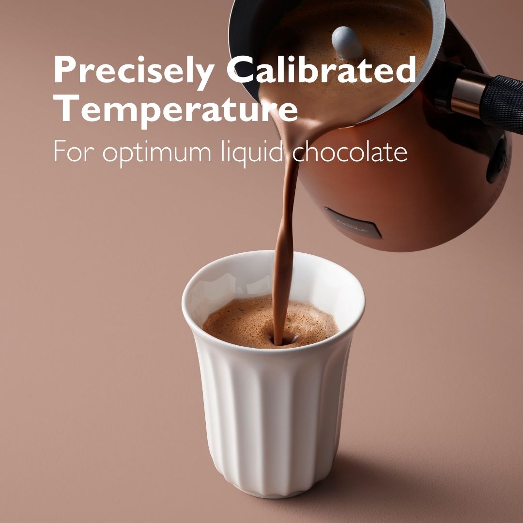 Image of hot chocolate pouring from the velvetiser hot chocolate maker. Caption reads "precisely calibrated temperature for optimum liquid chocolat"